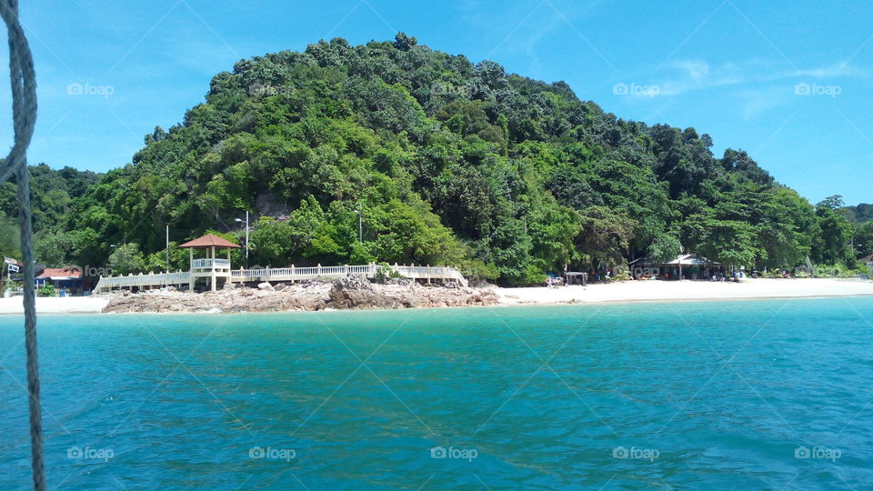 tropical island , Malaysia. taken from Speed boat while travelling to exotic Kapas Island in South China Sea