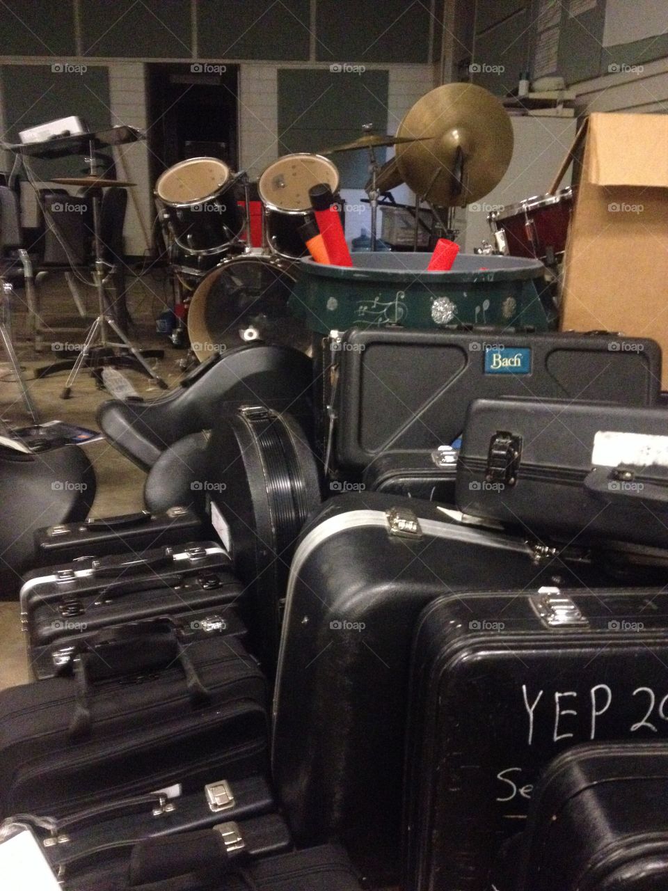 End of the year. Instruments in cases in band hall
