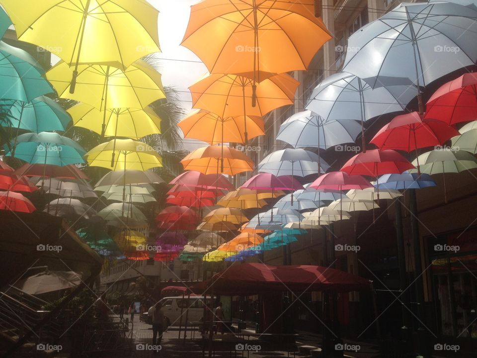 Rainbow Umbrellas in the Market in Mauritius 
