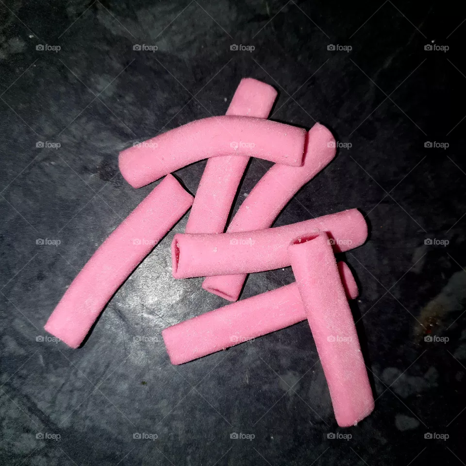 Tasty pink filled candies.