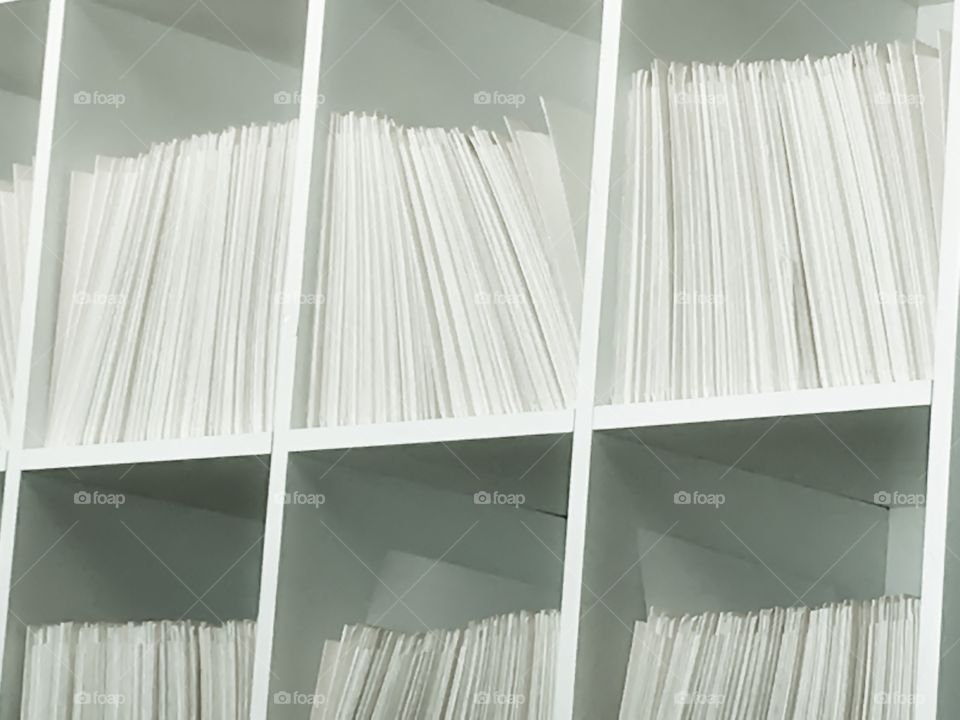 Office shelves full of files, suitable as background image; medical field