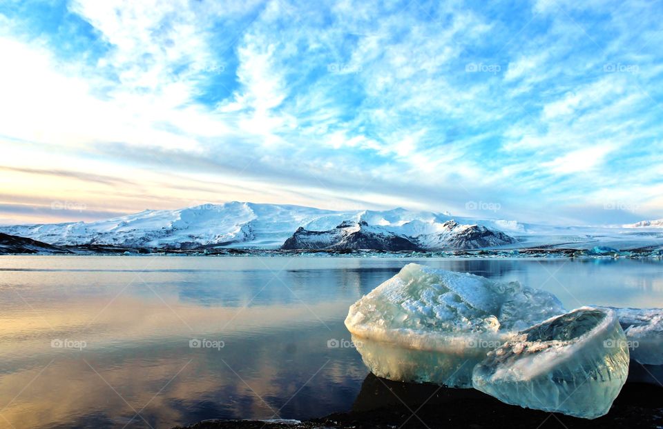 glacier lagoon in Iceland. giant blocks of ice crystal floating on lake mirror