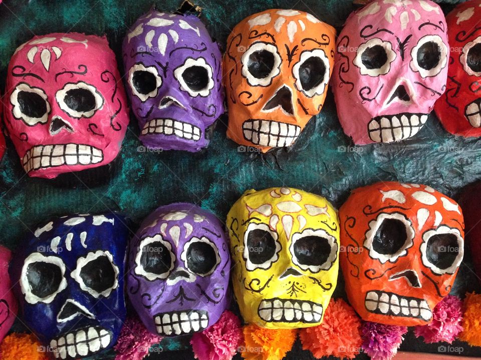 eight colorful skulls