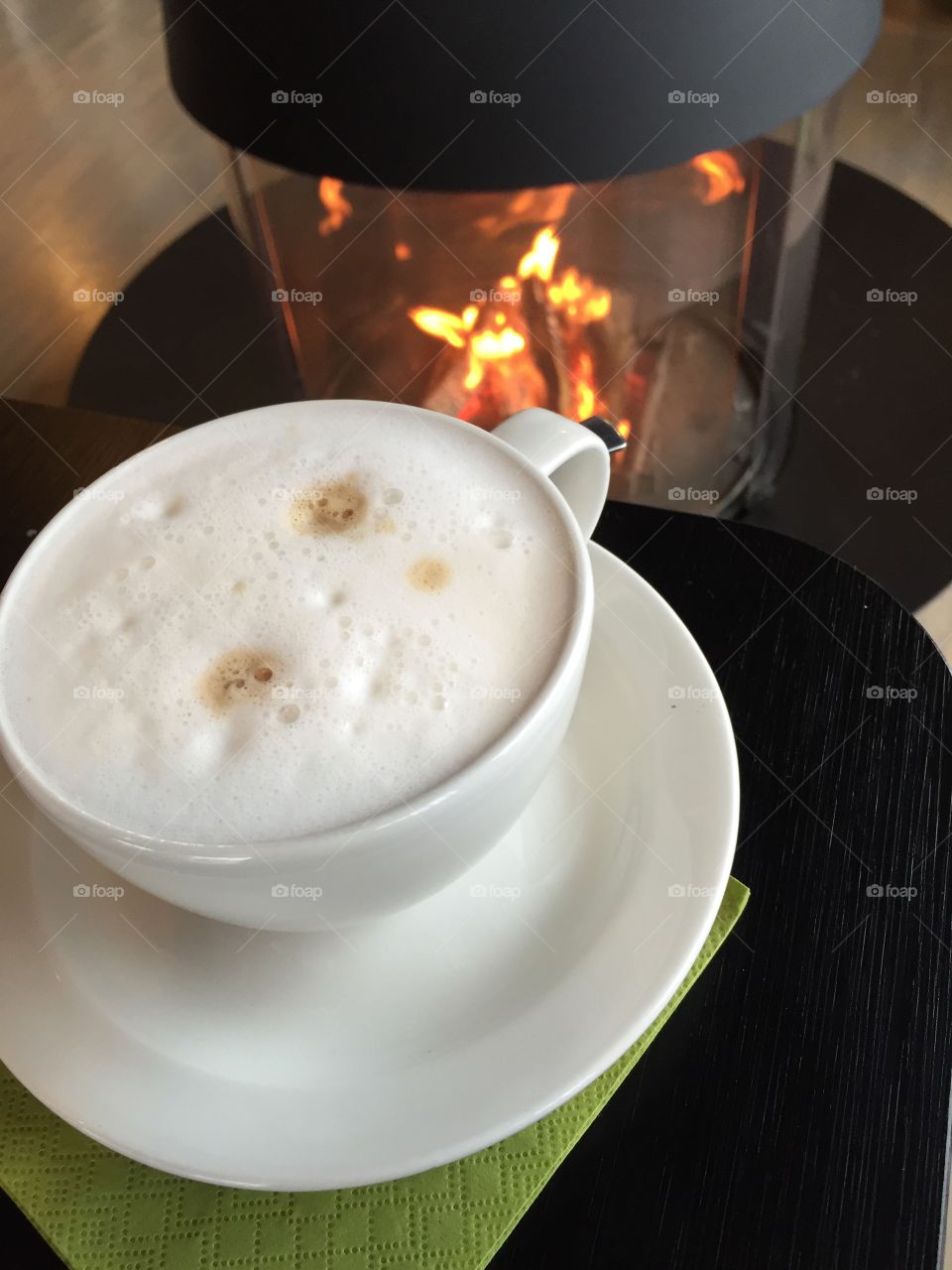 Tea latte on wood table