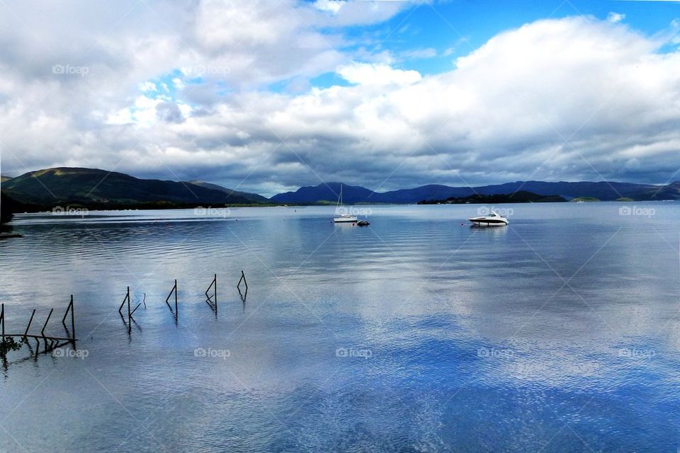 Yachts moored on a lake