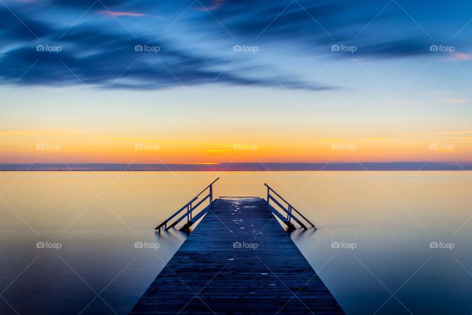 Empty board walk in lake