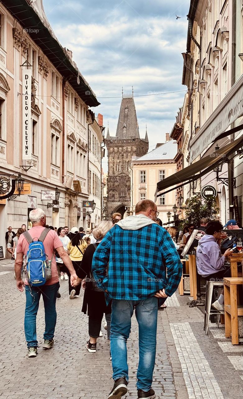 Crowd of people walking on the street of Prague