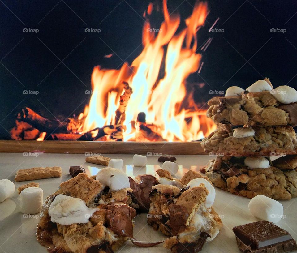 Enjoying s'mores cookies by the fire.