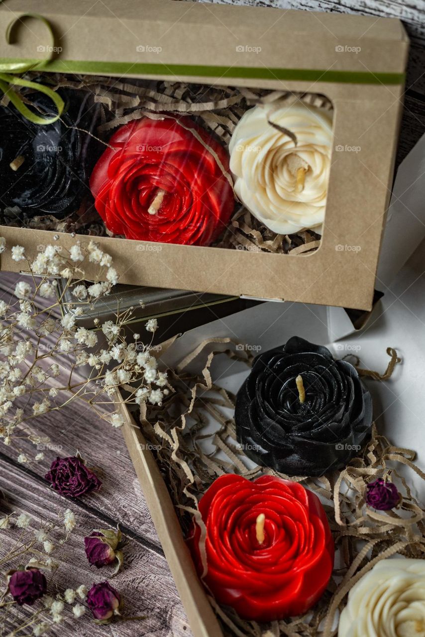 Composition of a candle in the form of roses, handmade