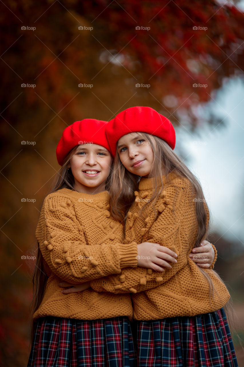 Twins girls outdoor portrait 