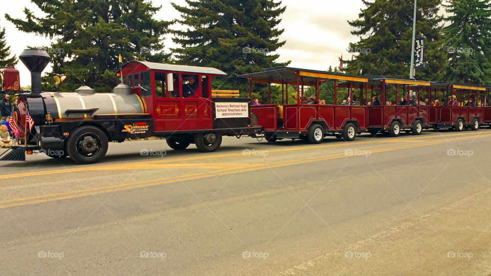 Street trolley cruising down the road in the Vigilante day Parade in Helena MT