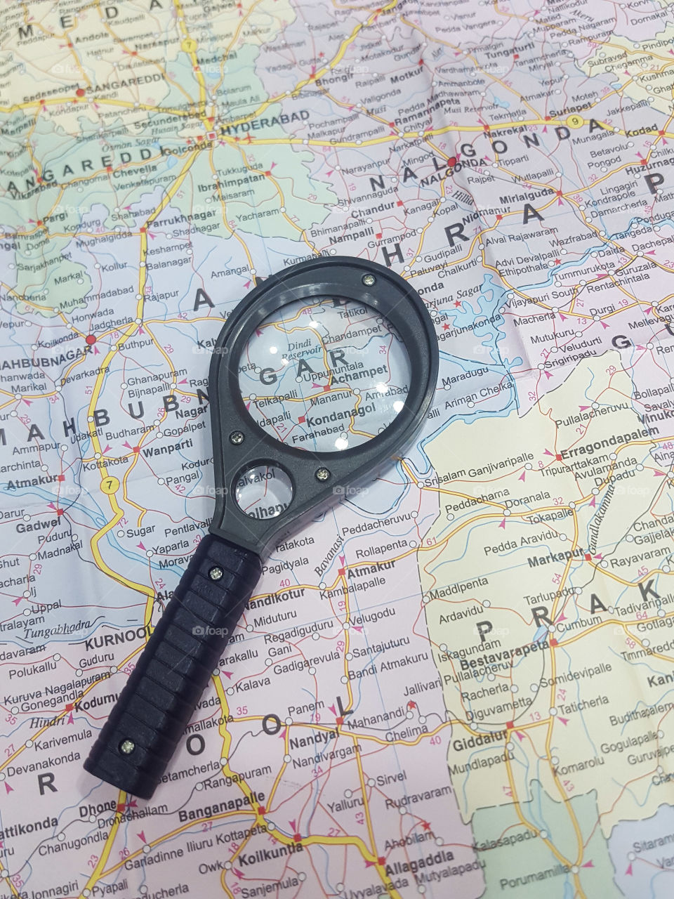 Plastic Magnifying glass on a Map