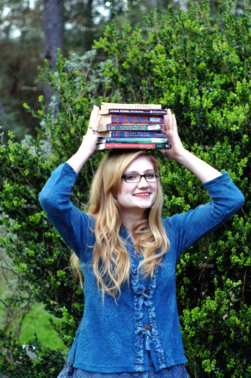 Books on Pretty Girl's Head. I decided to put my currently reading list on my head!