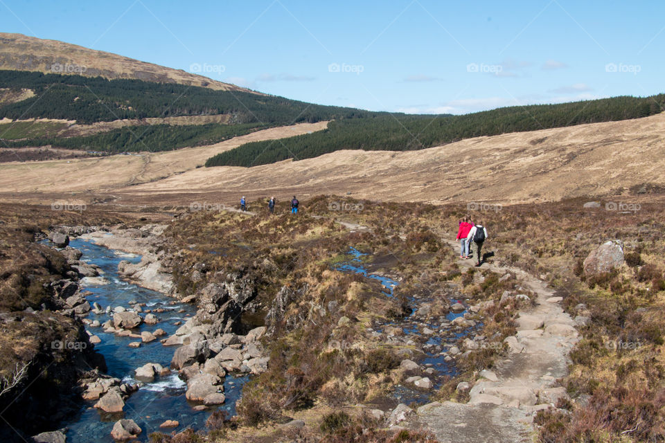 People hiking at the fairy pools 