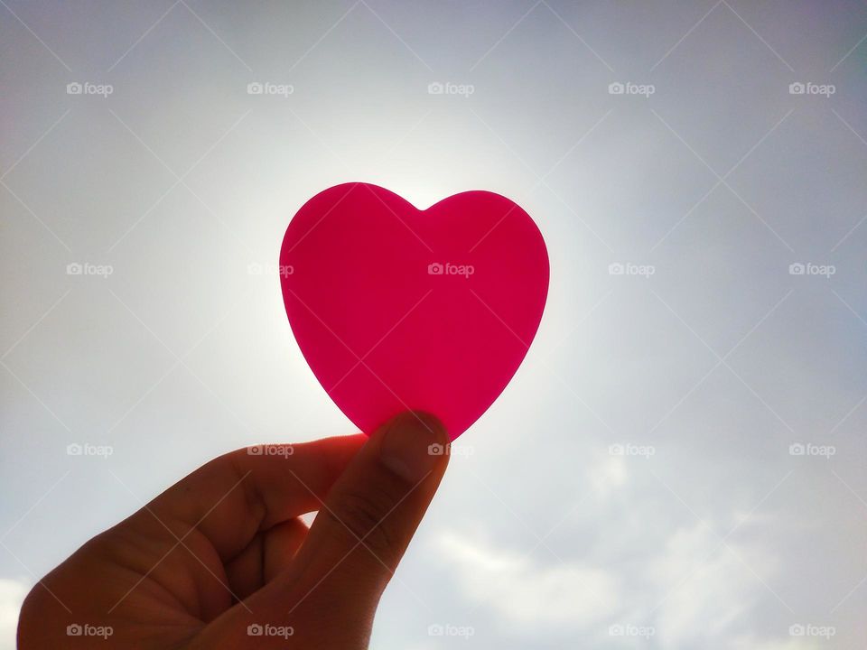 power of love , the shining love heart in the place of the sun , love concept