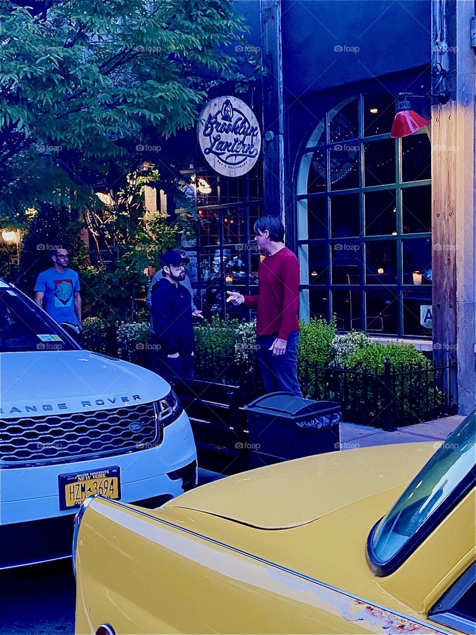 This is near the entrance to the “BOX HOUSE HOTEL” on “Clay Street” in “Greenpoint”, Bklyn. There is a restaurant on the ground floor, the “Brooklyn Lantern” and yellow cabs frequently wait outside for potential customers. 2023. Hypnotic Productions