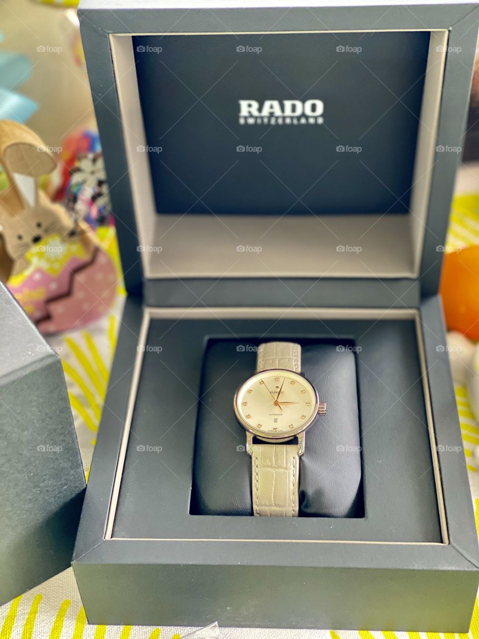 glad clock, glad clock as a gift for Easter, holiday gift Swiss clock glad, festive table, Easter, decorations on the table, joy, holiday, eggs, gifts