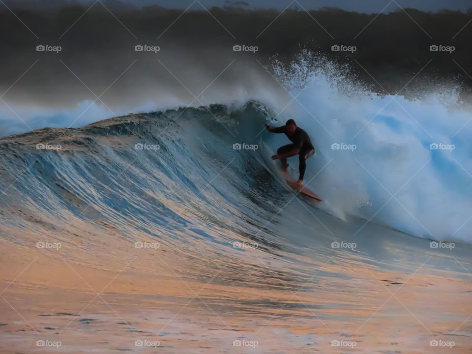 Sunset surfing
