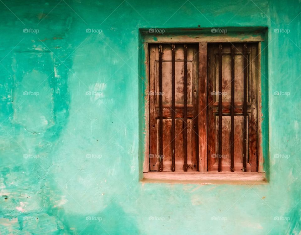 Closed window on wall