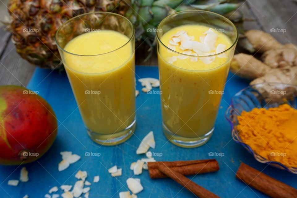 Pineapple mango coconut turmeric coconut cinnamon ginger smoothies