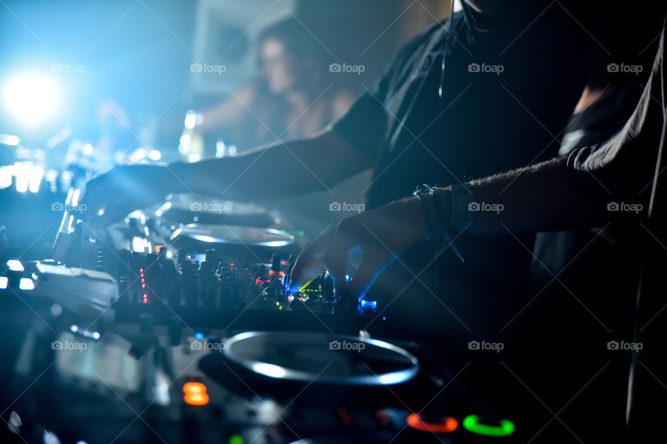 dj-ing in a club in Ibiza