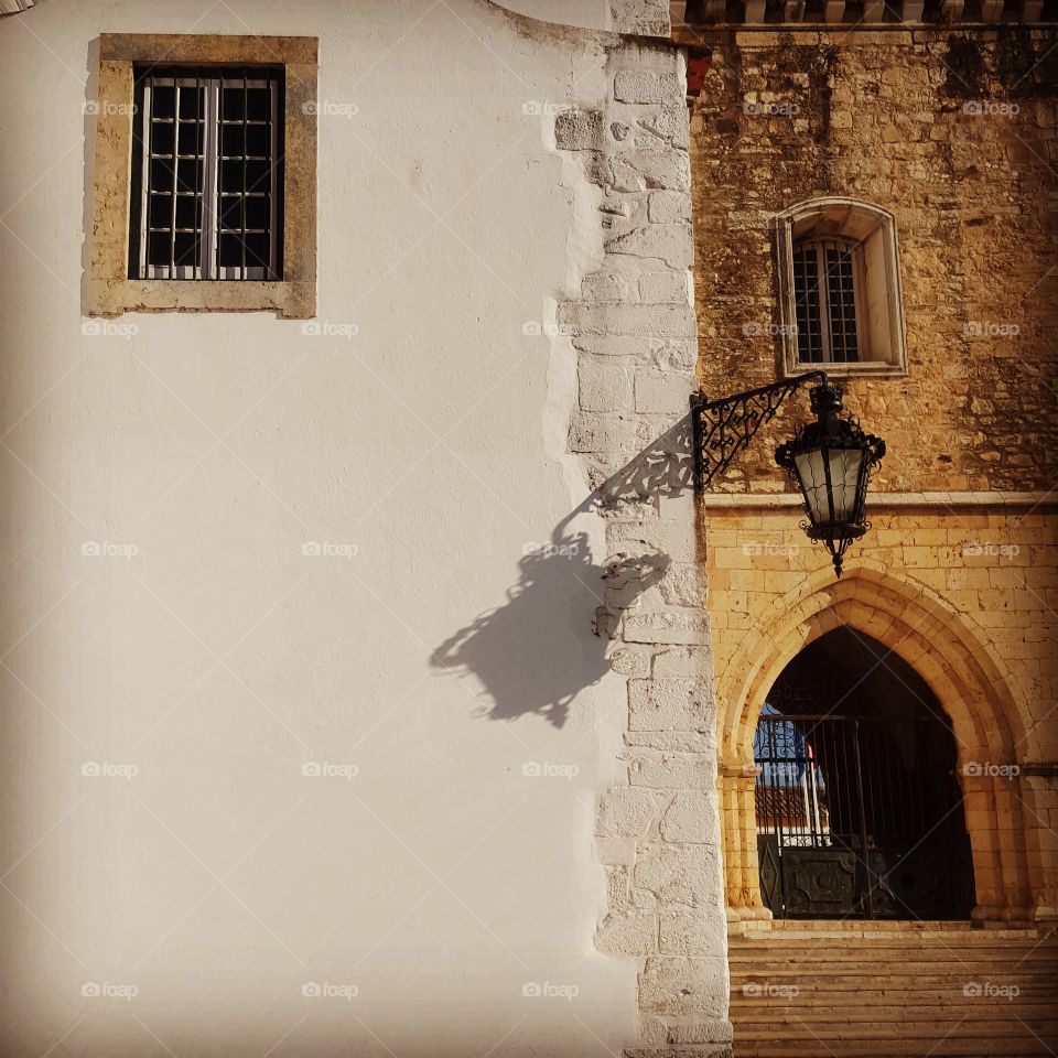 Faro (Old town). Shadow in the wall of Faro's cathedral