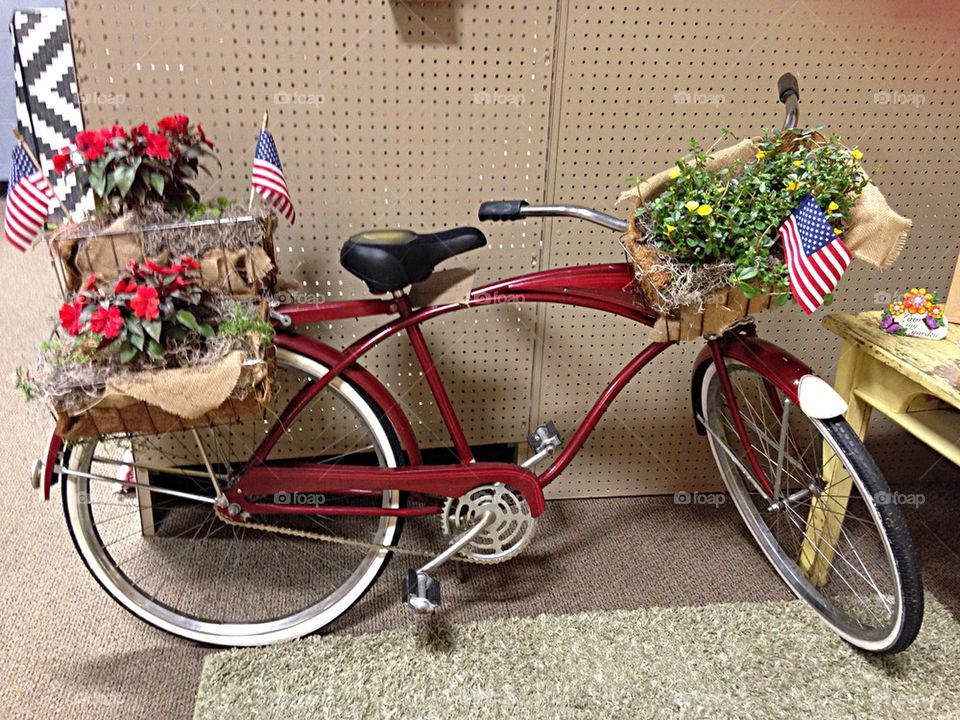 Bicycle with flowers and flags