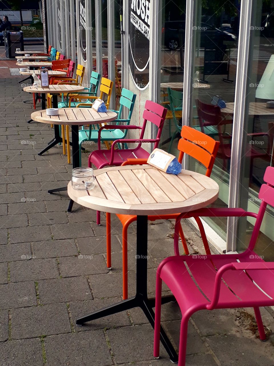 colourful chairs on the city