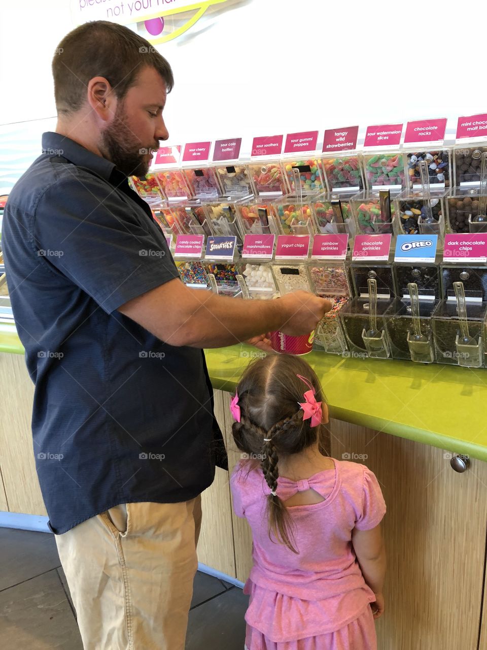 Daddy Helping His Little Girl at Menchie’s