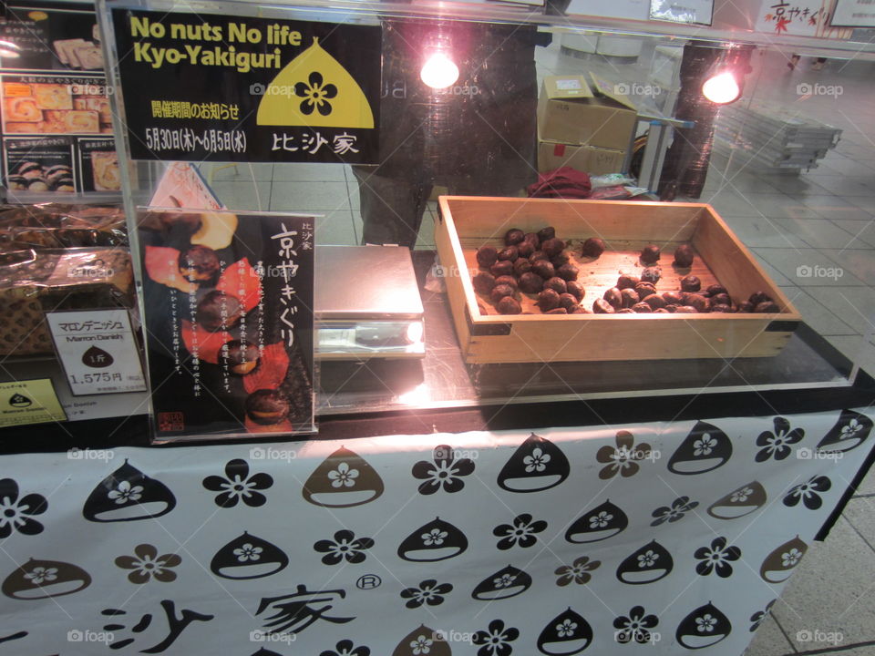 Fresh Roasted Chestnuts for Sale at Shinjuku Station, Tokyo, Japan. Yakiguri.