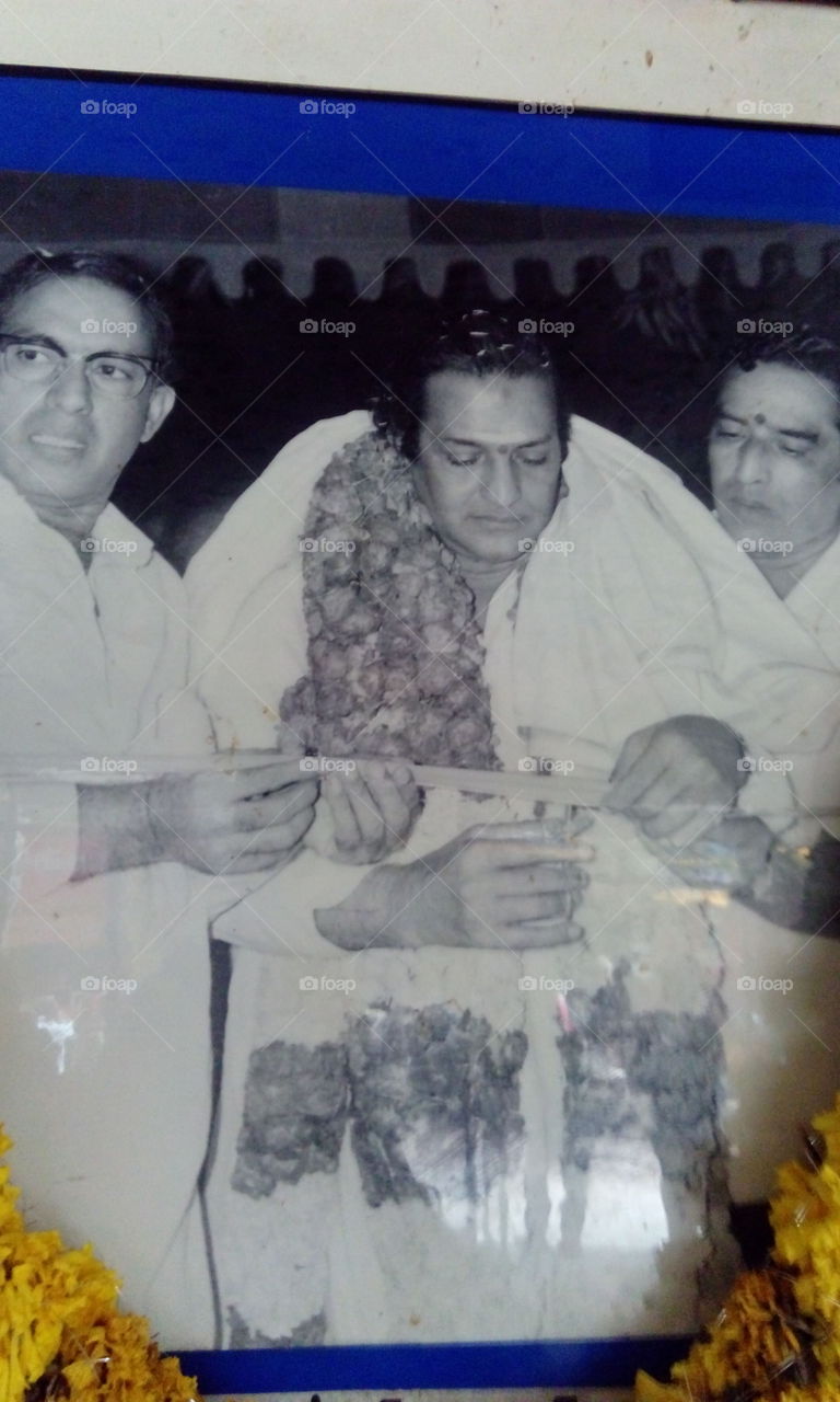 N.T . Rama Rao ,The eminent actor in India and perfectly suitable for any character ,especially for devotional characters . This pic is taken on 1976 in vijayawada Andhra Pradesh India . 
N.T.R is founder of  Indian national party T.D.P . He is our former chief minister.
Now chief minister of Andhra Pradesh is from T.D.P it self and he is son-in-law of N.T.Rama rao garu .we can't explain about him in few words . As a actor or politician or states man he done very well. All the people call him Anna (Brother).