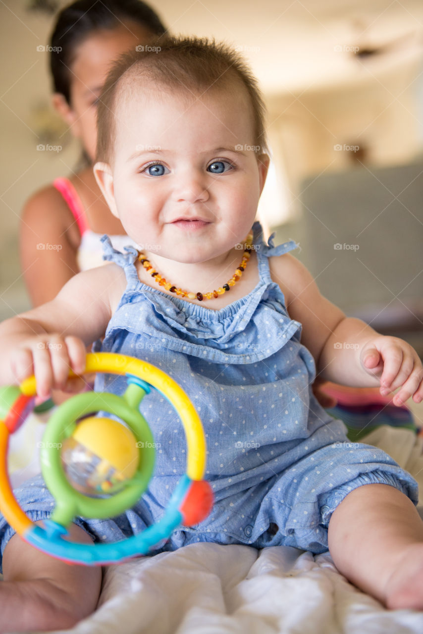 Baby playing with toys