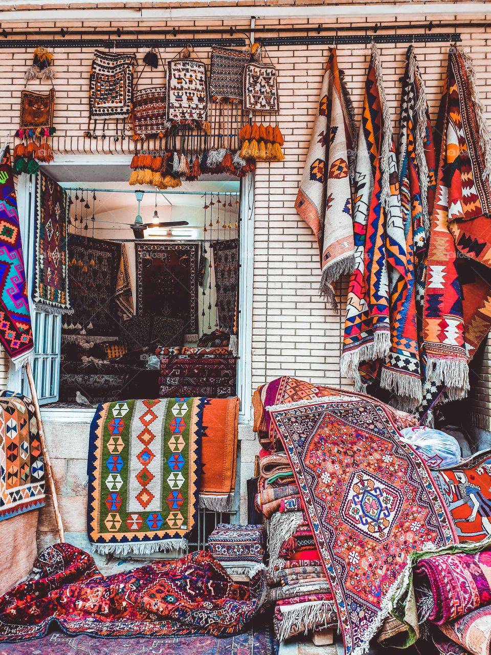 Charming colorful handmade carpets in Vakil Bazaar in Shiraz.