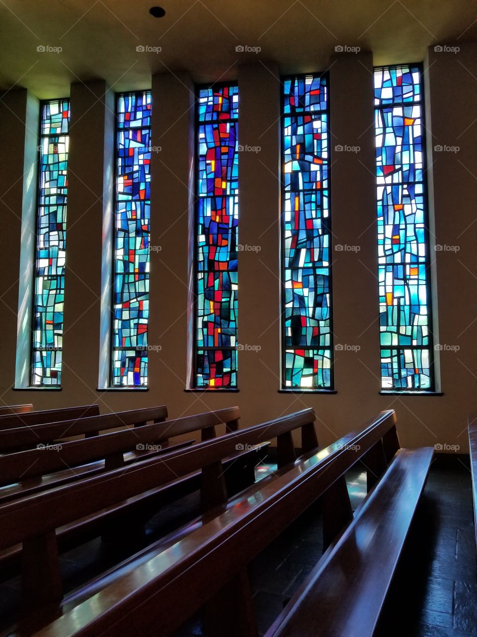 Colorful Stained Glass Windows in a Chapel