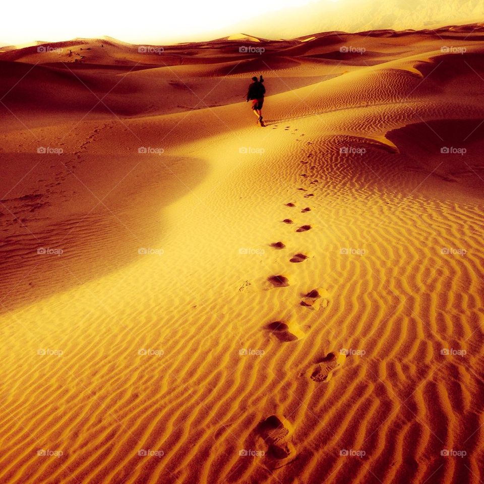 Man walking in the sand
