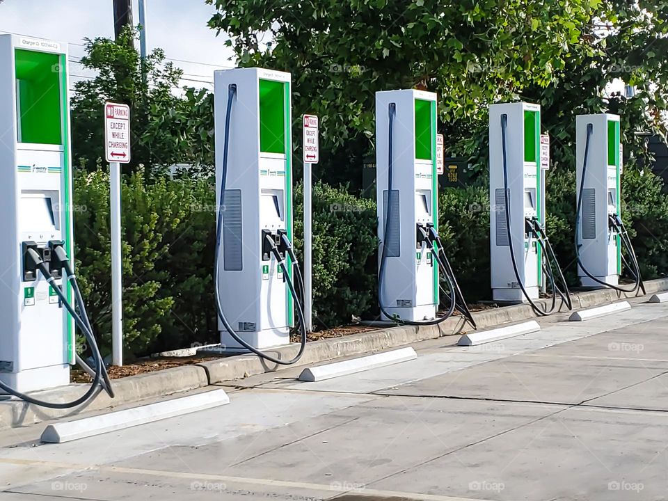 Multiple electric car charging stations in a row