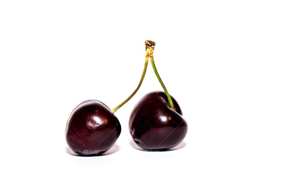 Cherries on white background