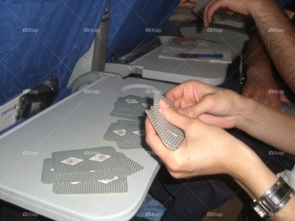 Learning card games on the plane to pass the time 