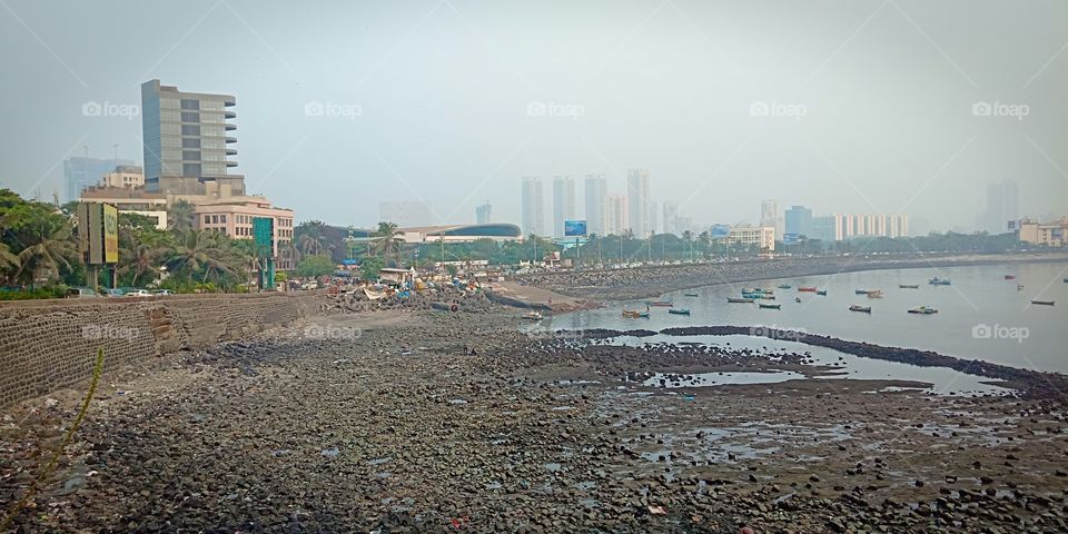 #seashore#hajialiarea#noperson#city#water#buildings#boats#cityview#