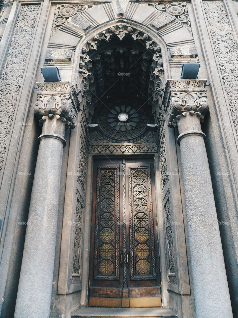 old wooden doors with columns in the house of an actor in the city of Kiev