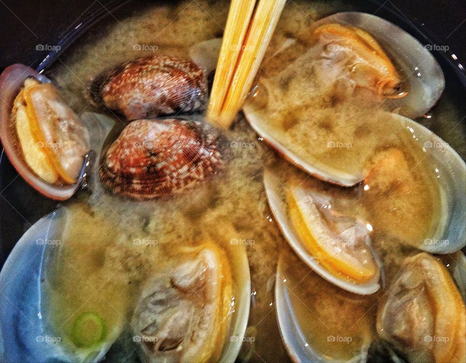 Steamed clams in soup