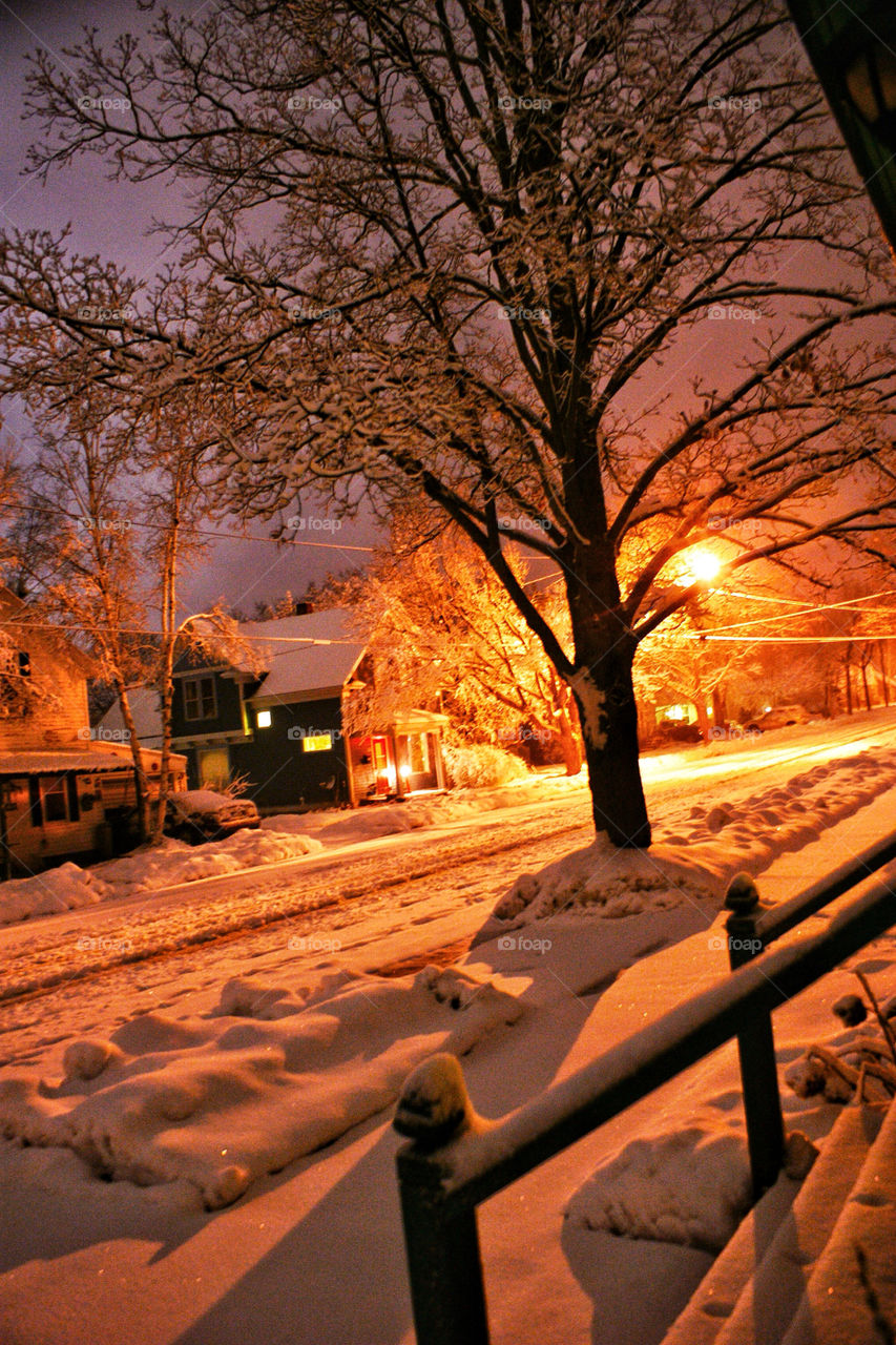 I love winters in Wisconsin . Looking out the front door watching it snow 
