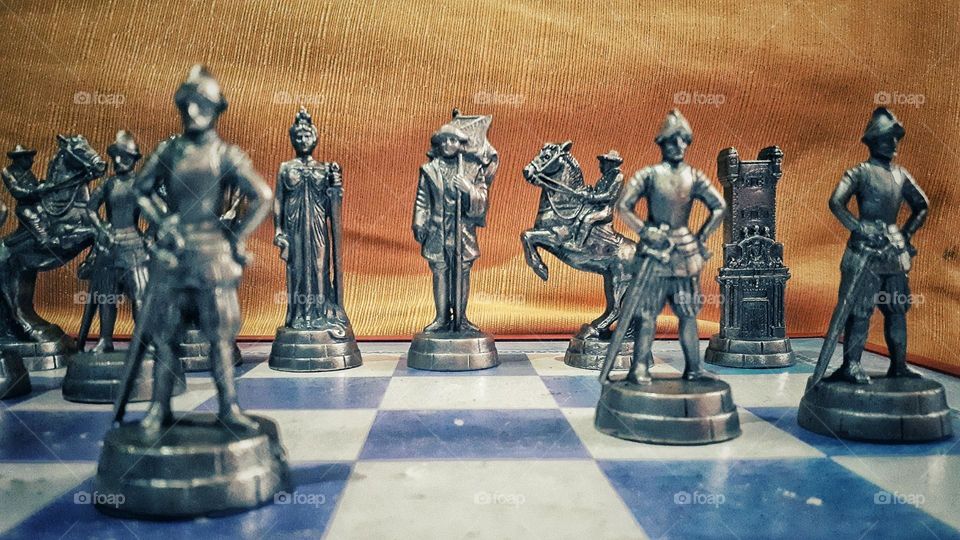 metallic chips on chessboard