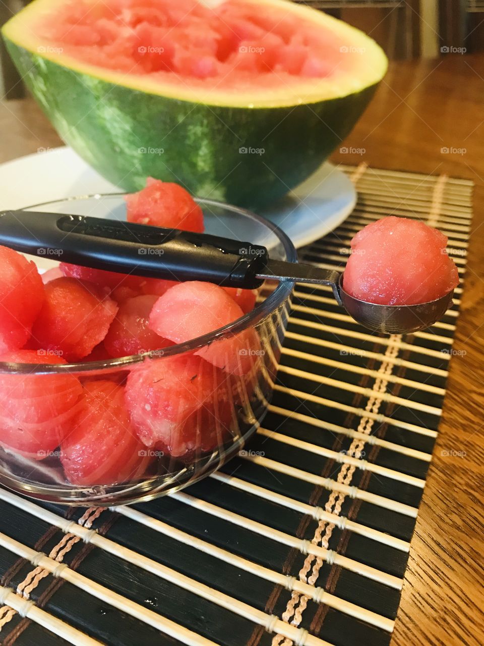 Super fun way we like eating juicy watermelon...making our bites into delicious watermelon balls! 