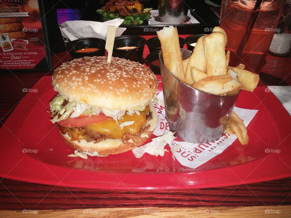 traditional american burger and fries. Hard Rock Cafe in New York