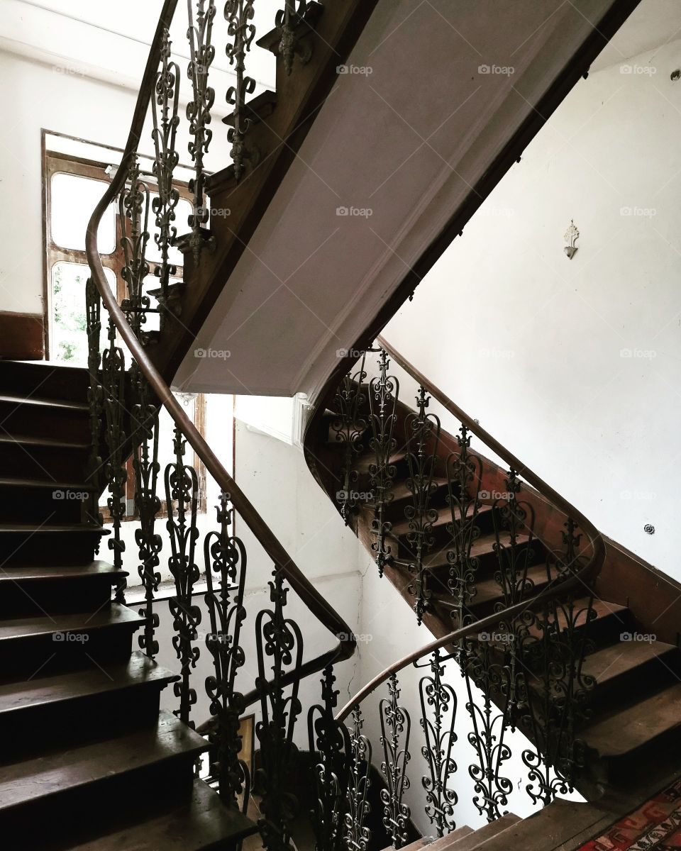 staircase wrought iron in dilapidated house