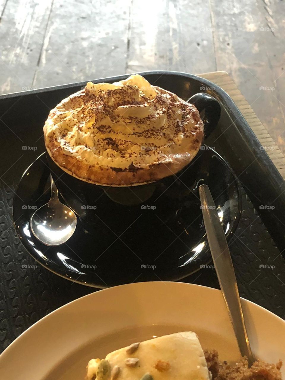 Delux got chocolate topped with cream and marshmallows 