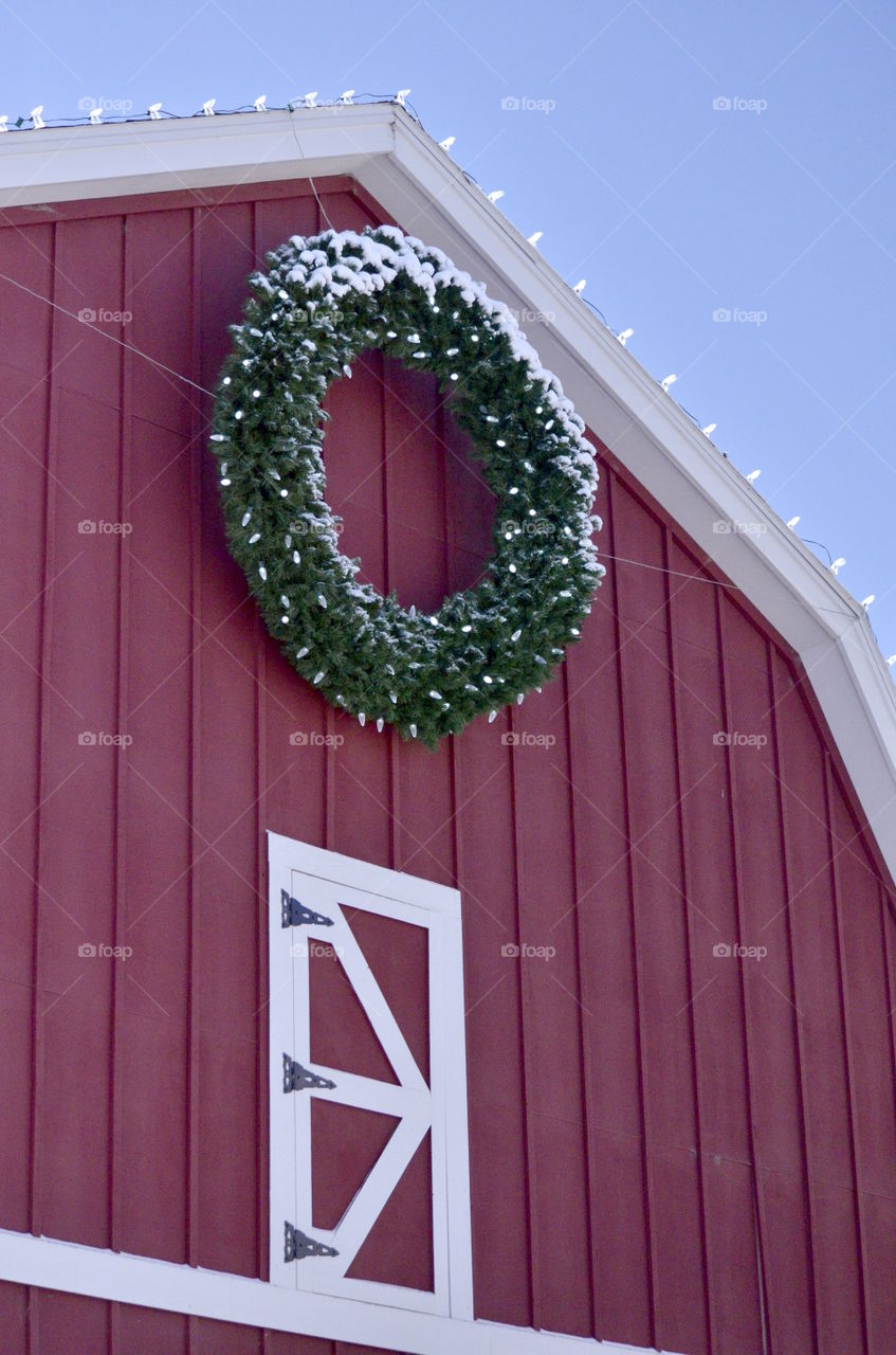 snow on barn wreath