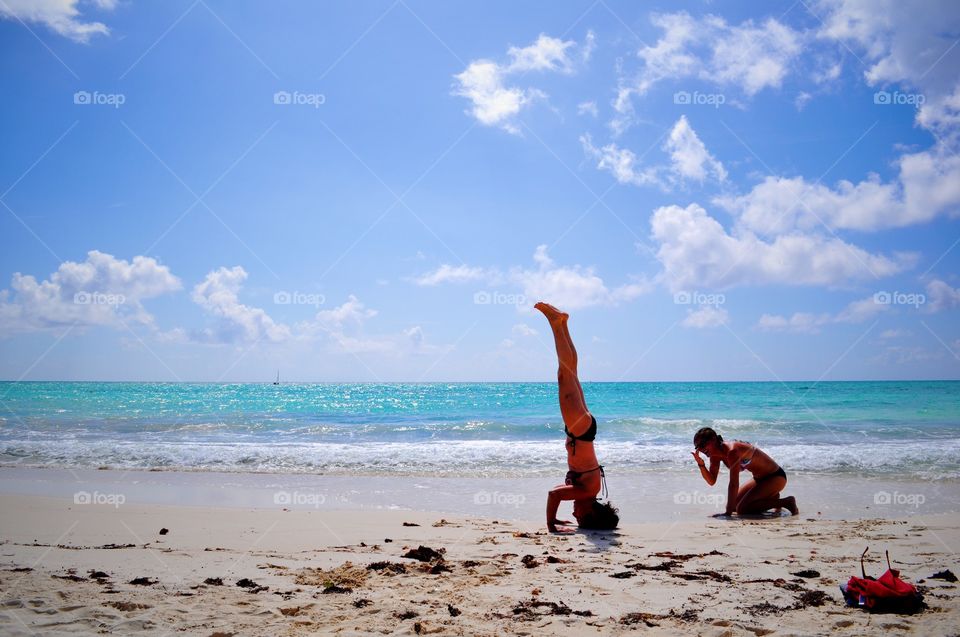 Mama Teaches Balance. Riviera Maya, Mexico 