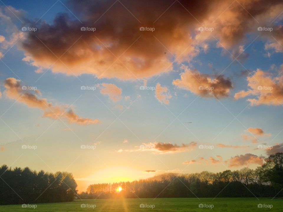 Fluffy clouds and sunsets